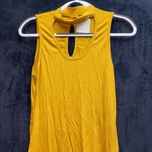 Sleeveless yellow blouse